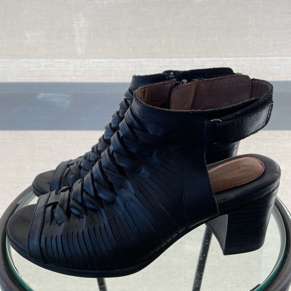 Rockport gladiator black leather sandals/heels in great used condition. Size 7US